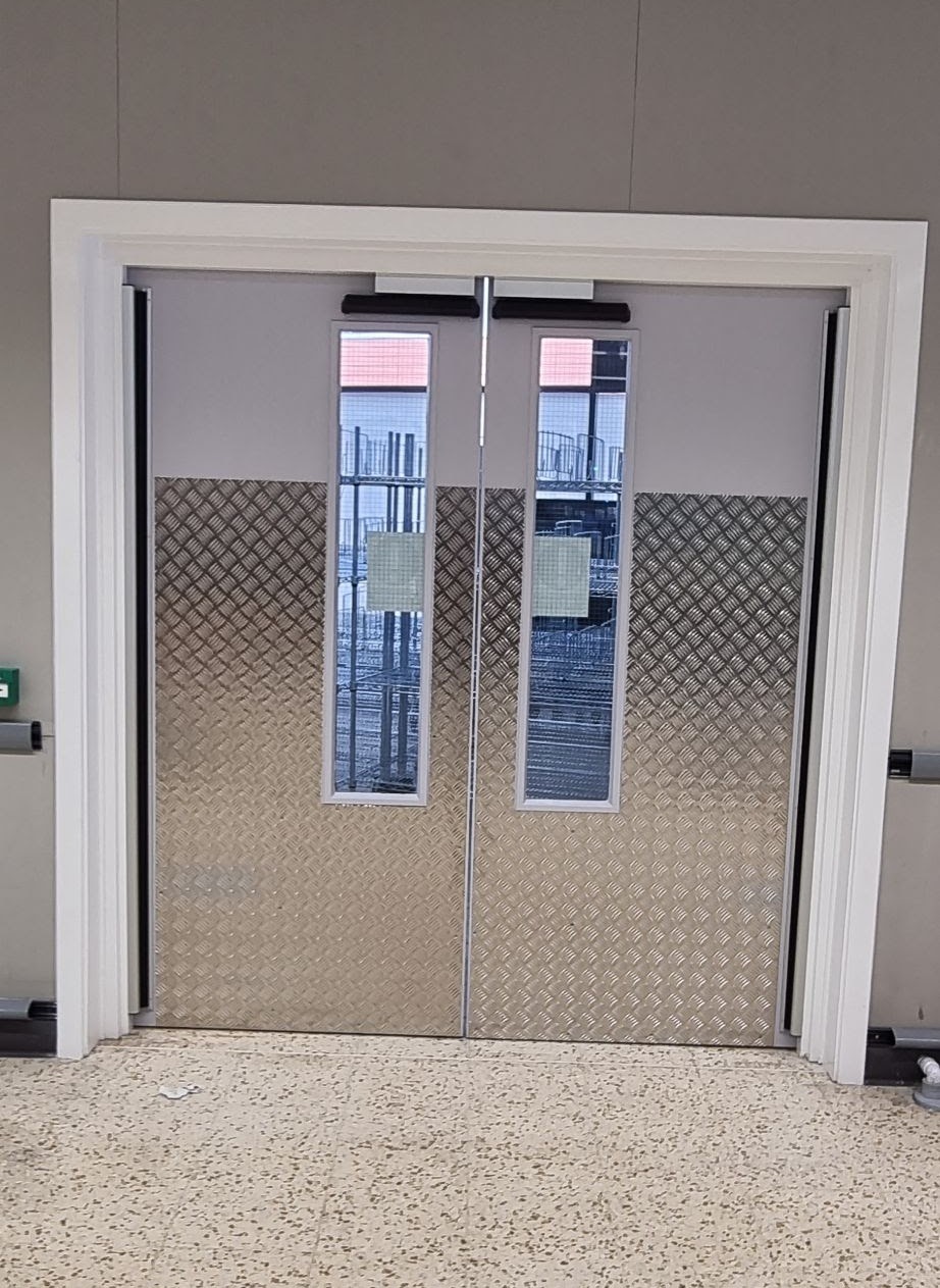 Aluminium shopfront detail — heritage colour finish