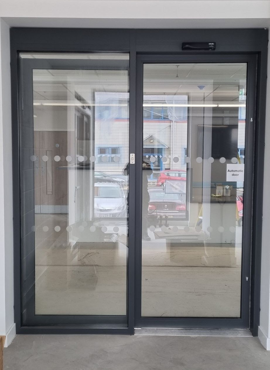 Automatic door operator and header detail