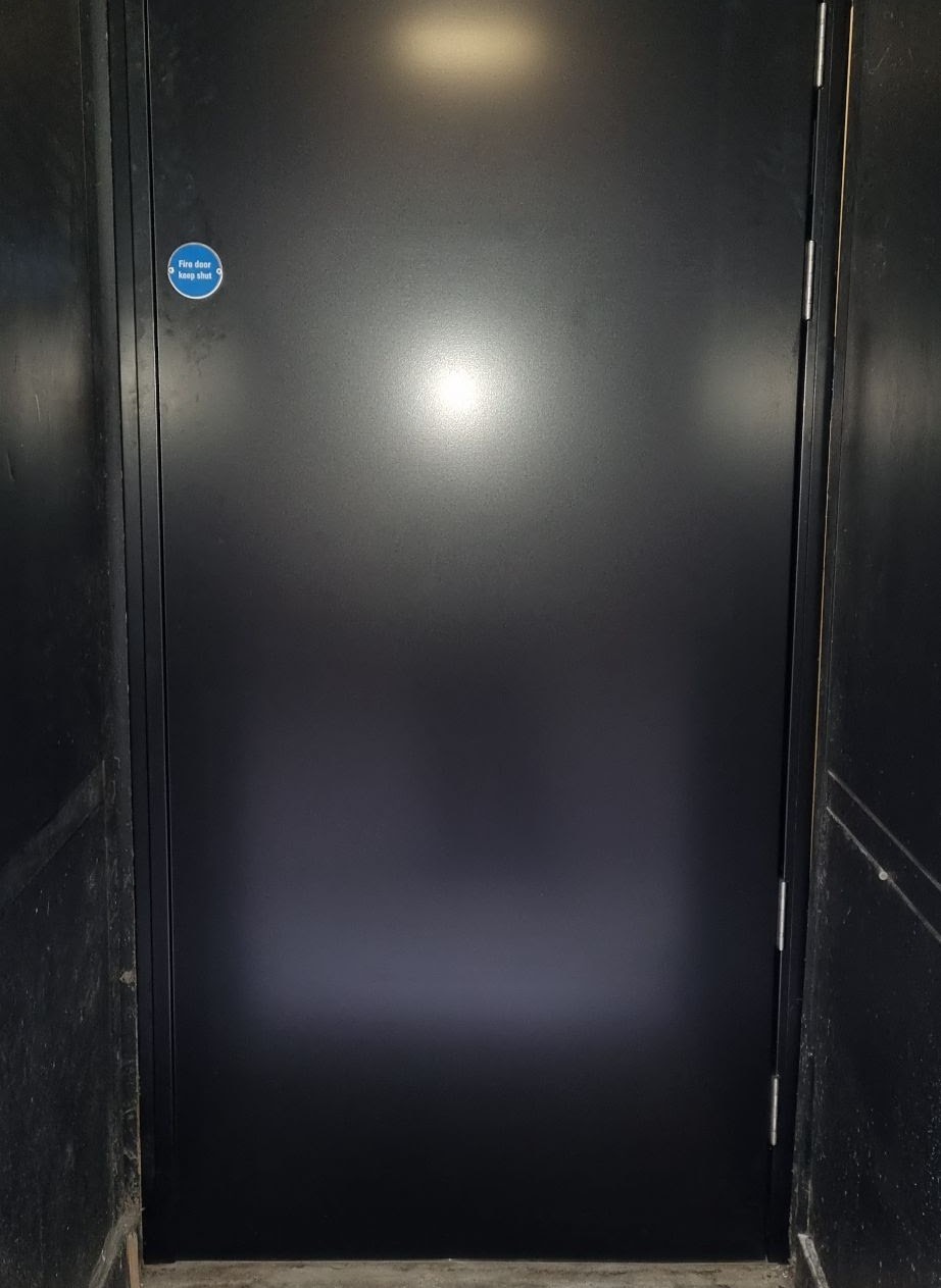Steel fire door installation to FD60 standard