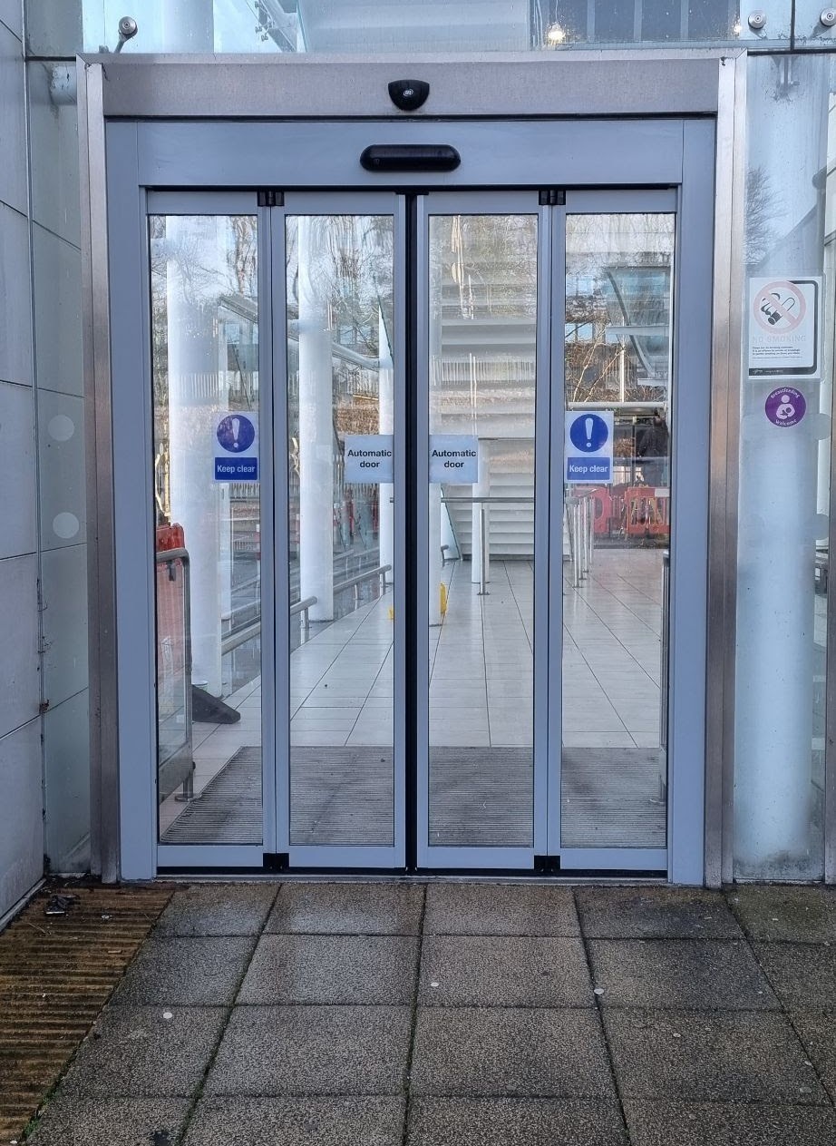 Telescopic automatic sliding doors at healthcare entrance